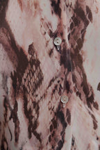 CAMISA SEMITRANSPARENTE ESTAMPADA